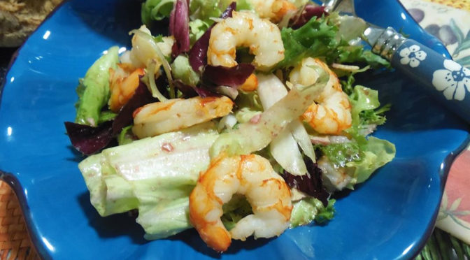 Insalata melagrana e gamberi alla fiamma