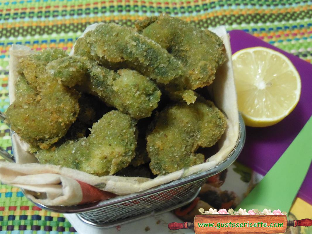 Gamberoni fritti panati agli spinaci